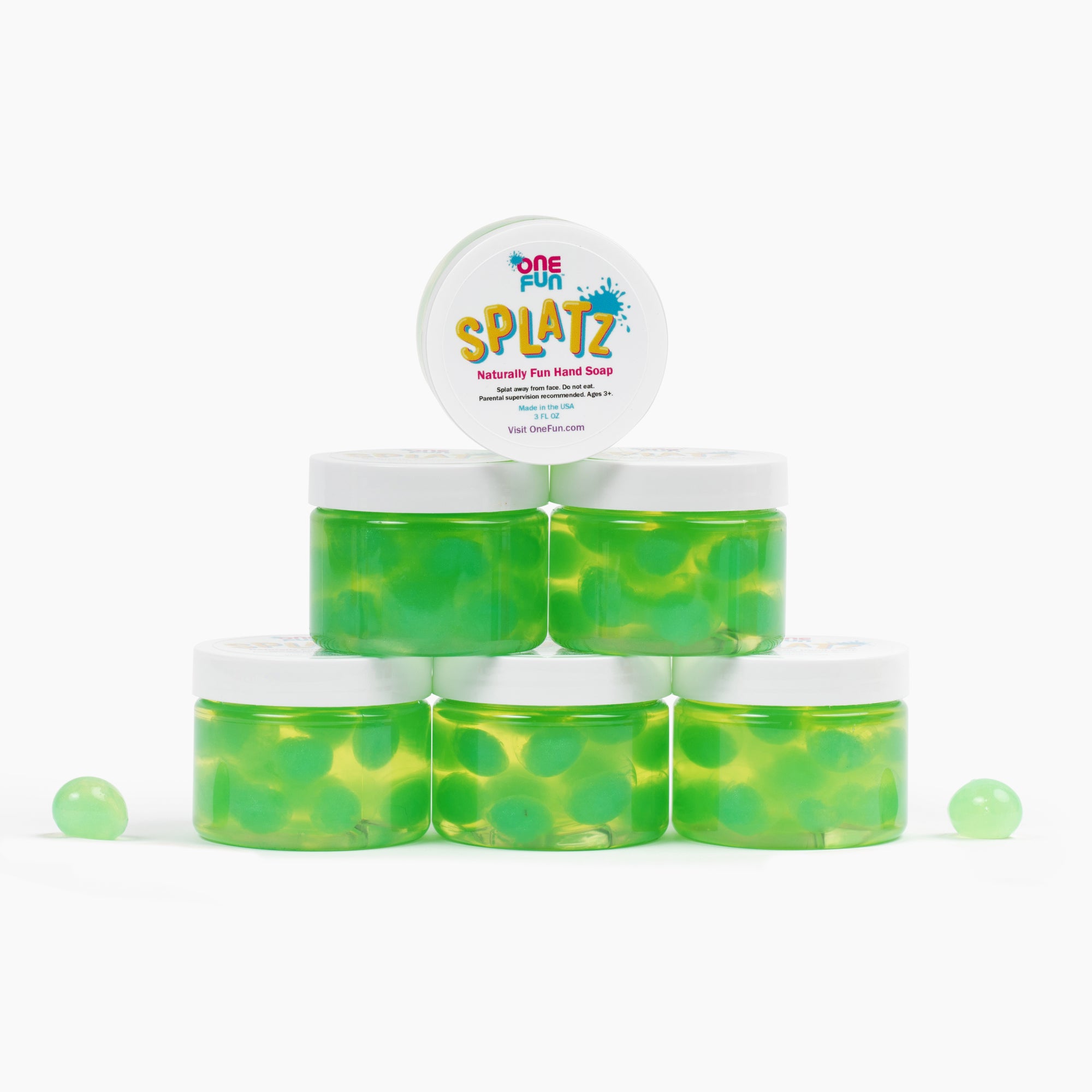 6- 3oz jars of green bursting soap bubbles stacked up into a pyramid
