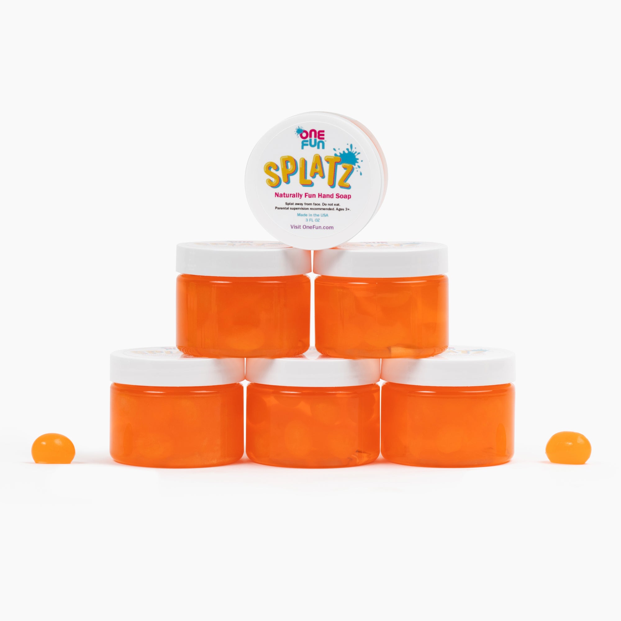 6- 3oz jars of orange bursting soap bubbles arranged in a pyramid